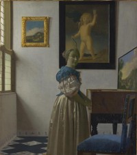 Картина автора Вермеер Ян под названием A Young Woman standing at a Virginal